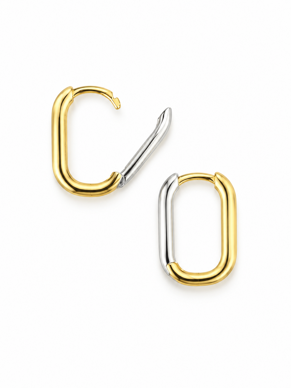 Double-tone Link Huggie Hoop earrings in yellow gold and white rhodium, with one hinged clasp open to show the reversible construction