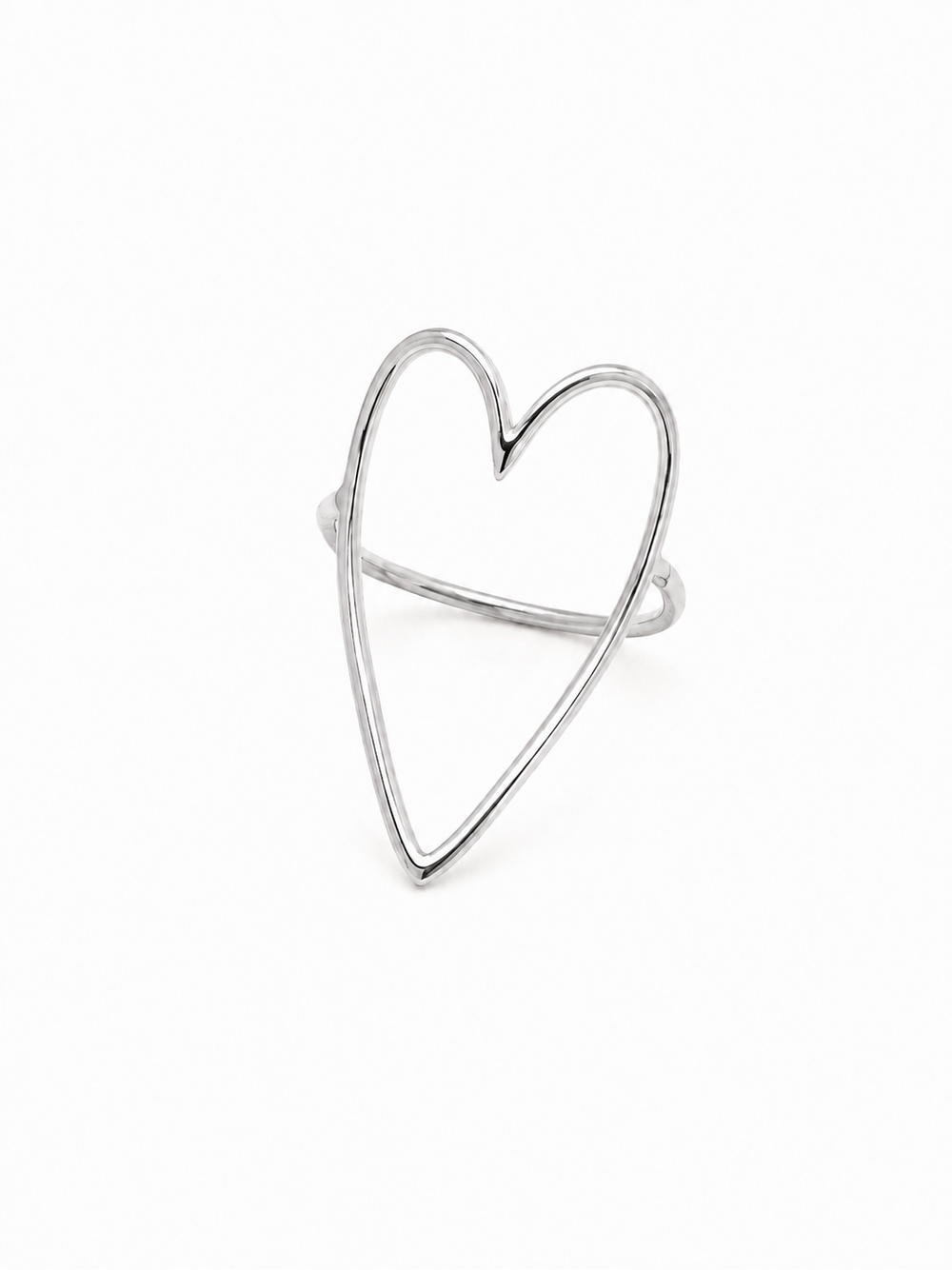 Freehand heart statement ring in polished white gold, front three-quarter product view on white.