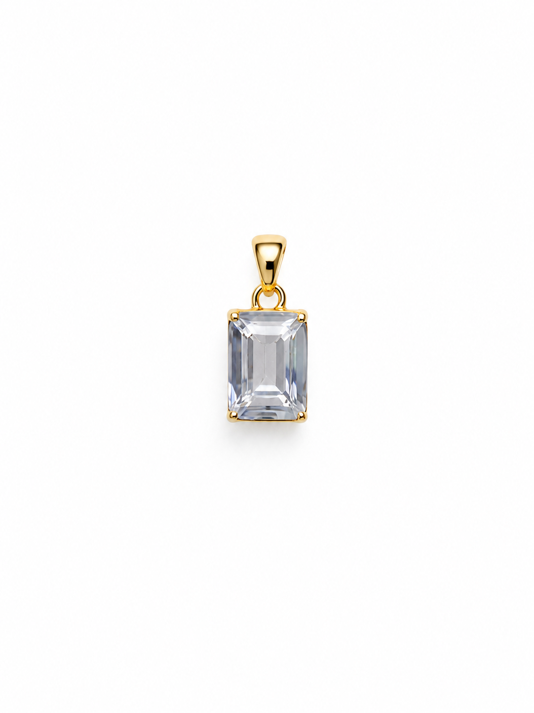 Sapphira clear emerald-cut statement pendant in a yellow-gold setting with tapered bail, shown without a chain on white.