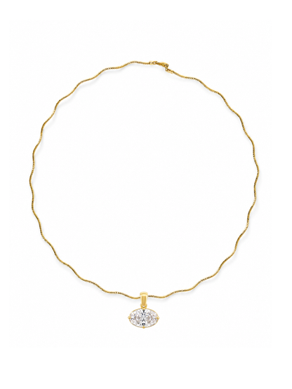 Miro clear east-west radiant pendant with yellow-gold bail and setting, shown on white.
