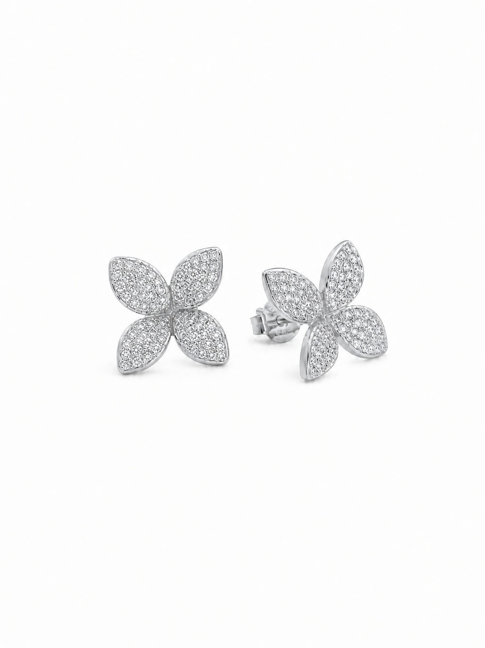 Ecommerce product view of the 3D Four-Petal Pavé Stud Earrings in 18K white gold vermeil, showing the pair's lifted marquise-shaped petals, dense white pavé stones, polished white-gold rims, posts, and butterfly backs on a pure white background.
