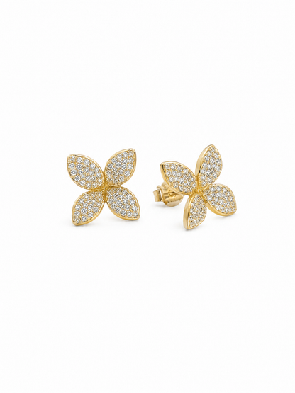 Ecommerce product view of the 3D Four-Petal Pavé Stud Earrings in 18K yellow gold vermeil, showing the pair's lifted marquise-shaped petals, dense white pavé stones, polished gold rims, posts, and butterfly backs on a pure white background.