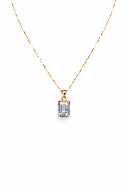Sapphira clear emerald-cut statement stone necklace in yellow gold, front product view.