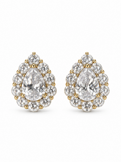 Aurelia yellow gold statement stud earrings with pear-cut cubic zirconia centers and round stone halos