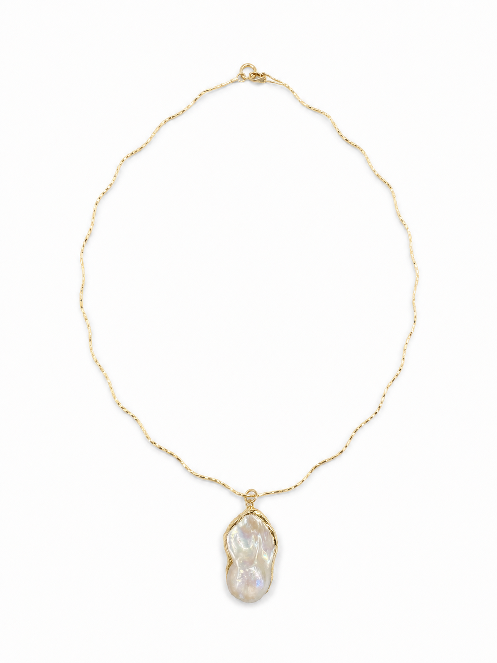 Irregular freshwater baroque pearl pendant on the yellow-gold Free-Willed Sculptural Necklace, shown on white.
