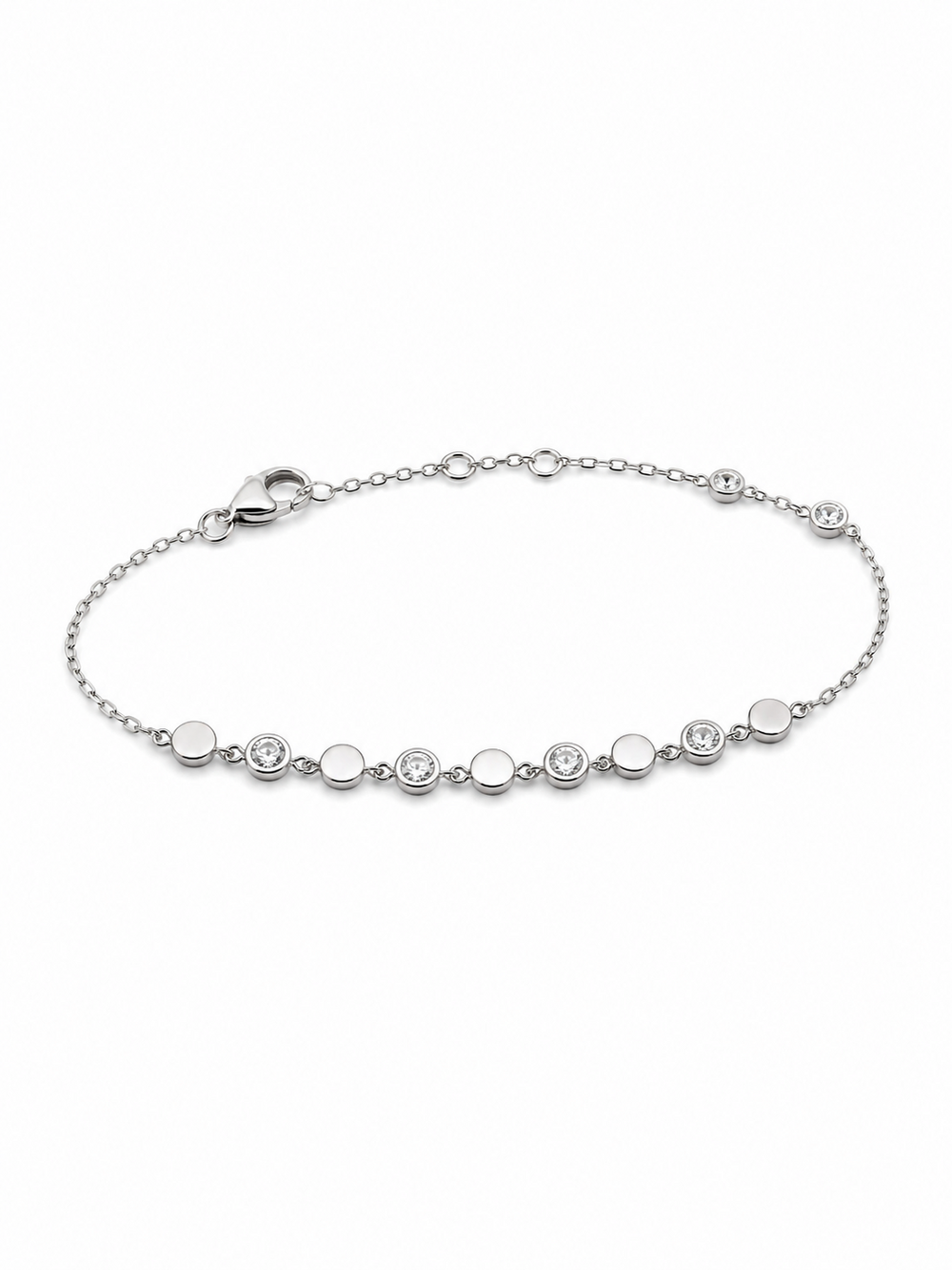 White gold bracelet with alternating polished discs and clear bezel-set stones on a white background.