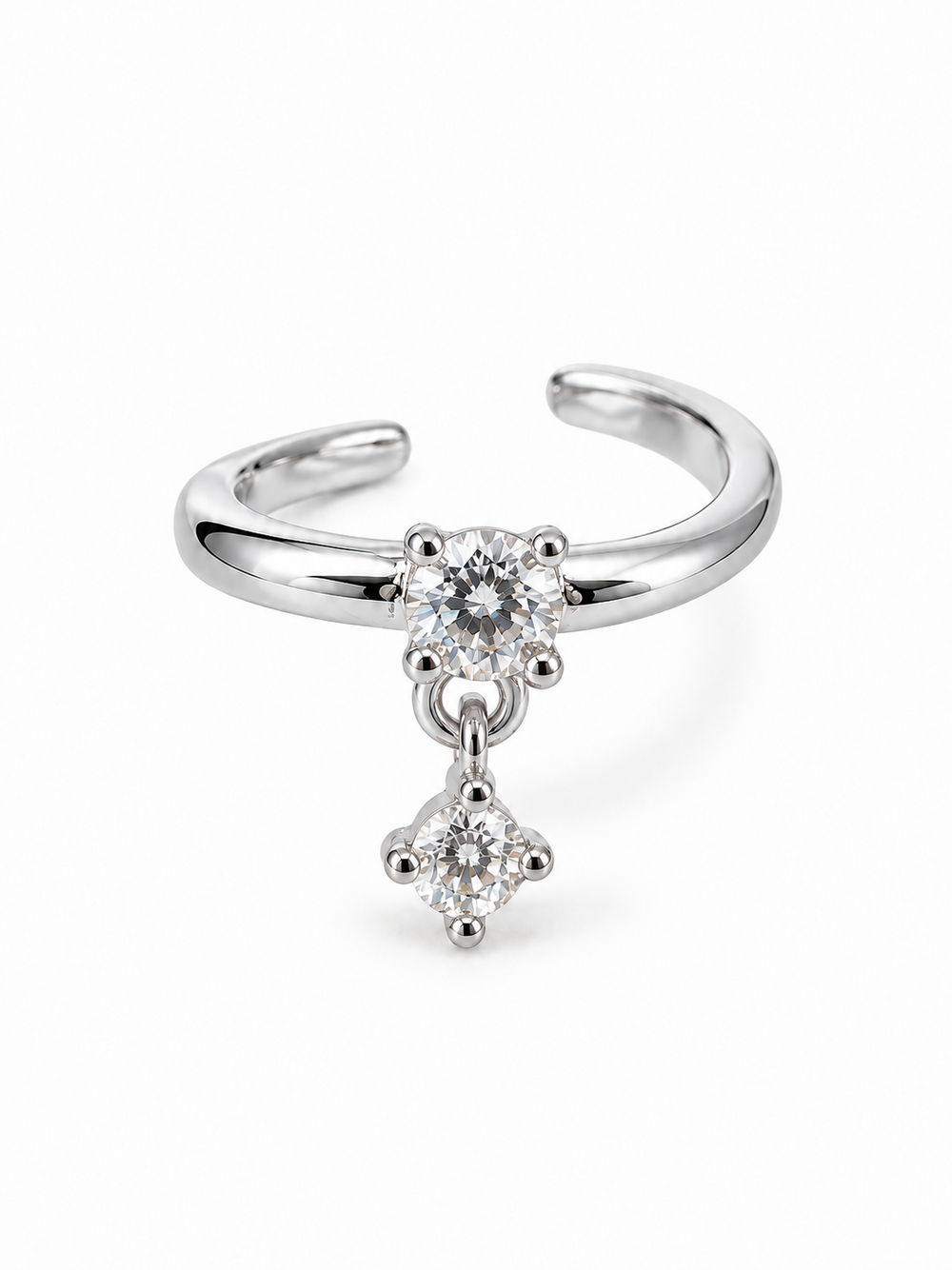 White gold-tone open ear cuff with one fixed clear round stone and a smaller articulated round stone drop