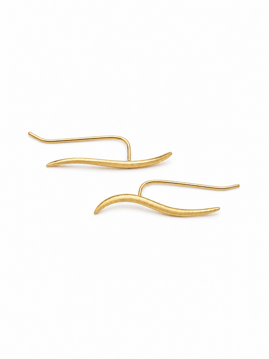 Ecommerce product view of the Face Forward ear climber earrings in 18K yellow gold vermeil, showing the mirrored pair's matte tapered wave fronts, slim polished back wires, U-shaped connections, and lightweight thread-through construction on a pure white background.