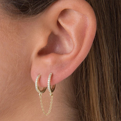 Model wearing pave detail connector earrings