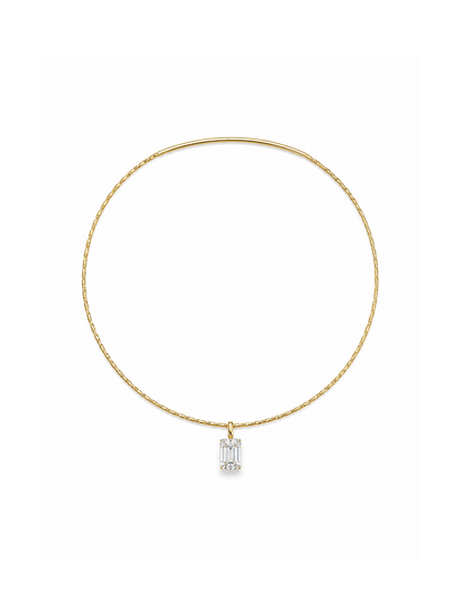 Yellow-gold sculptural collar necklace styled with one oversized clear emerald-cut rectangular statement pendant, showing its smooth upper curve and textured lower section on a white background.