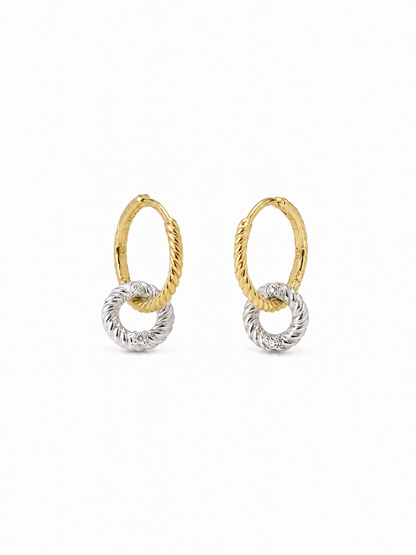 Pair of interlocking loop earrings with yellow-gold twisted upper huggies and smaller white-gold rope-textured drop loops, photographed on a pure white background.