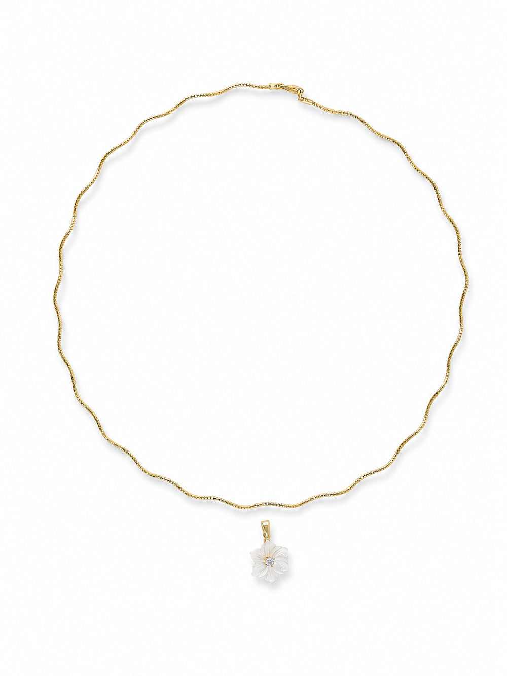 Lilli Floral Seaside Sculptural Necklace in yellow gold with the detachable five-petal mother-of-pearl flower pendant shown separated on a white background.
