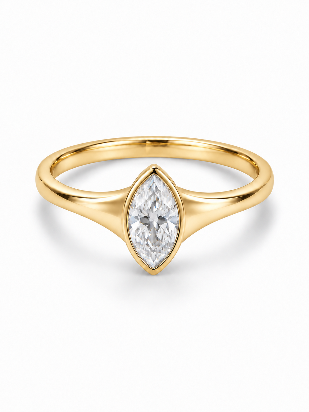 Yellow gold ring with solid tapered shoulders and a bezel-set marquise moissanite