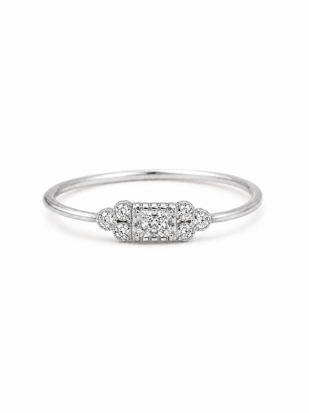 Mina Art Deco cluster ring in white gold with a clear princess-cut center stone and six round side stones