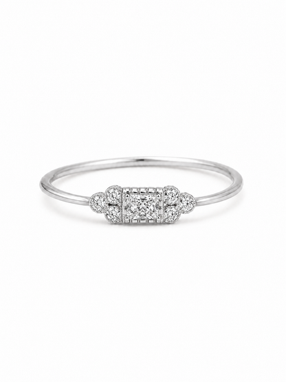 Mina Art Deco cluster ring in white gold with a clear princess-cut center stone and six round side stones