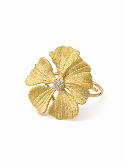 Ecommerce product view of the No Wallflower adjustable peony cocktail ring in 18K yellow gold vermeil, showing its matte textured sculptural petals, white pavé center, and slender adjustable band on a pure white background.
