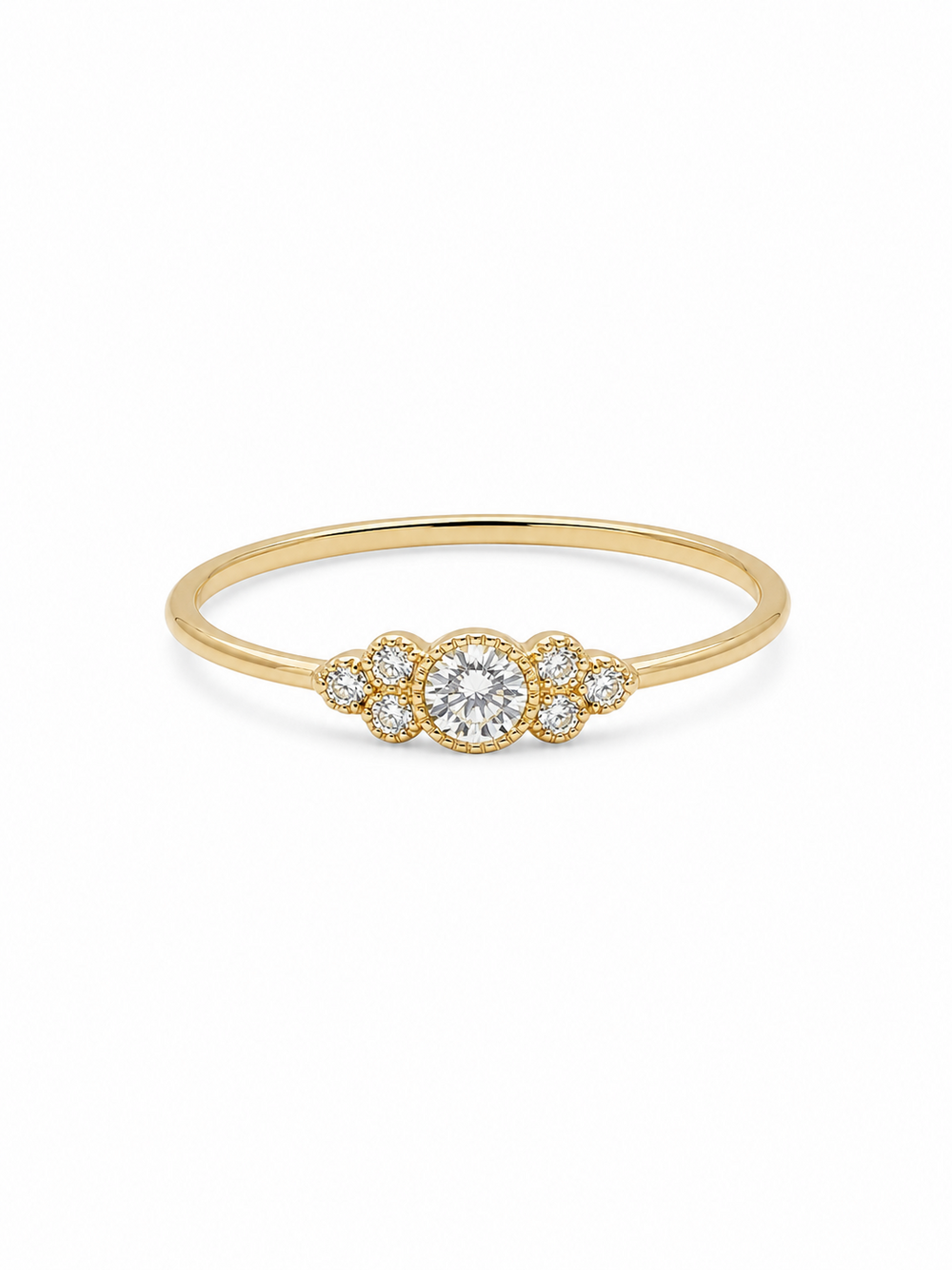 Noa round cluster ring in yellow gold with a clear circular center stone and six round side stones