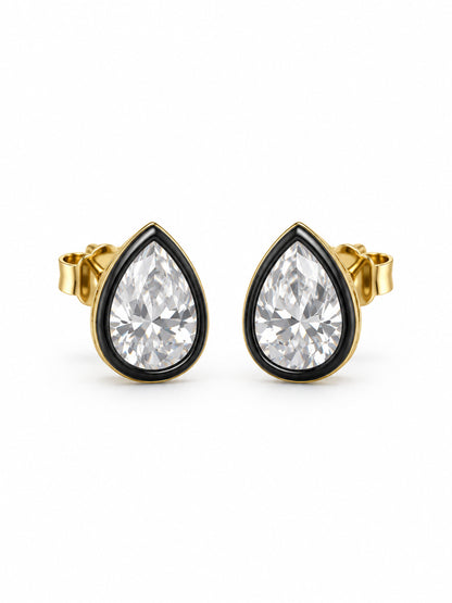 Front view of pear-shaped cubic zirconia stud earrings with elevated black rims and yellow-gold vermeil outlines on white