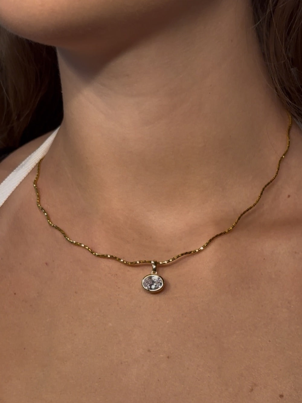 Yellow-gold Petite Single-Stone Bezel Pendant worn at the center of the Free-Willed scalloped sculptural necklace.
