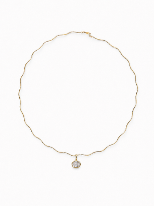 Petite Single-Stone Bezel Pendant hanging from the Free-Willed scalloped sculptural necklace in matching yellow gold, shown on white.