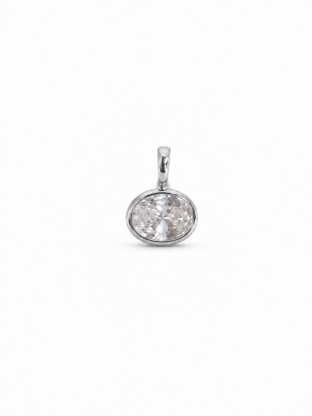 Petite single-stone bezel pendant in white gold with a clear horizontal oval faceted stone, shown without chain