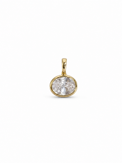 Petite yellow-gold pendant with one clear softly oval faceted stone in a slim polished bezel and a compact tapered bail, shown without a chain on white.