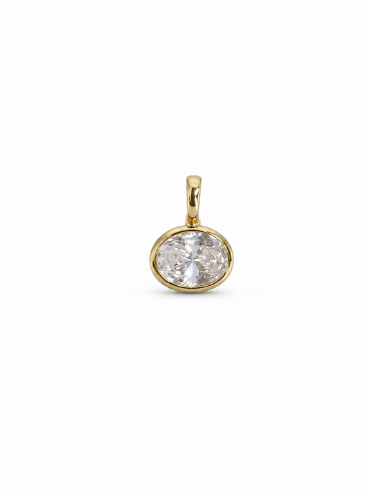 Petite yellow-gold pendant with one clear softly oval faceted stone in a slim polished bezel and a compact tapered bail, shown without a chain on white.