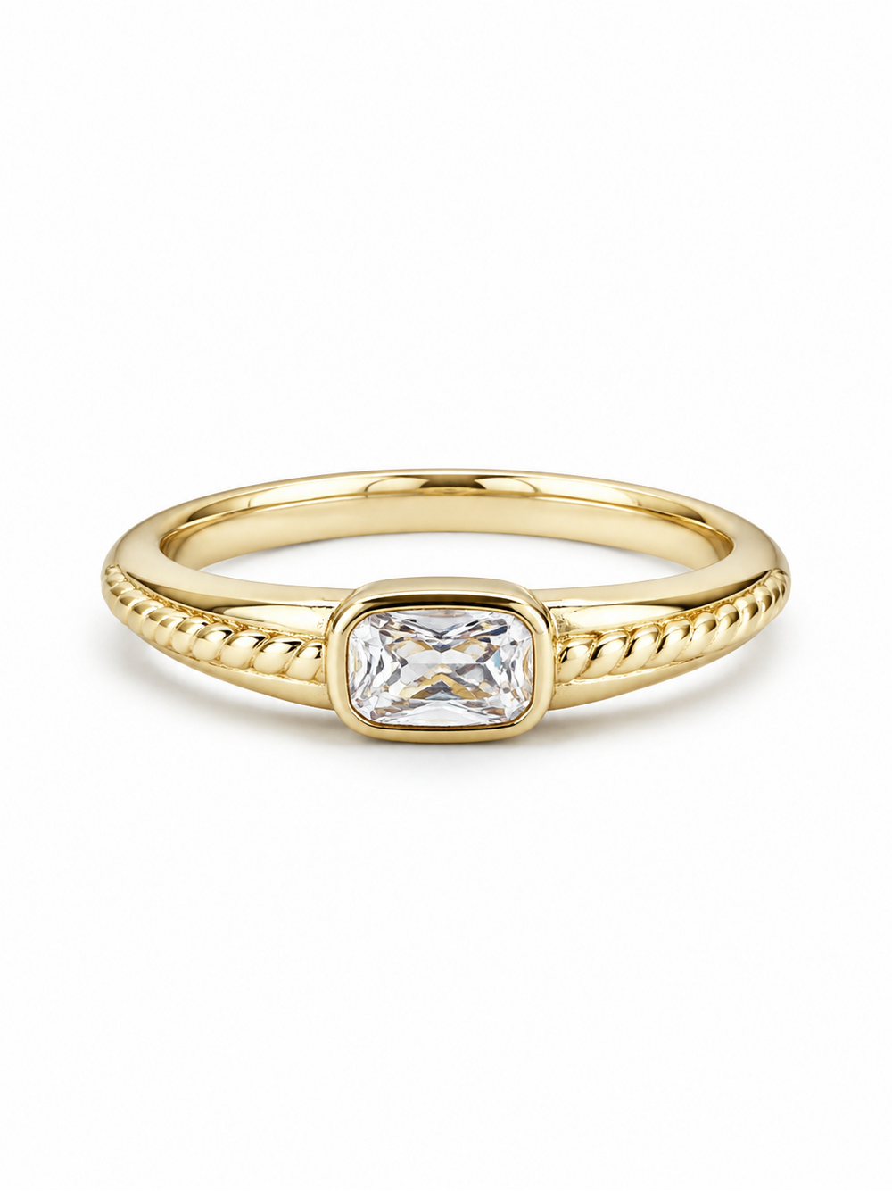 Yellow gold east-west clear rectangular bezel ring with rope-textured shoulders
