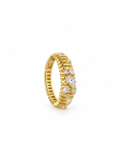Three-quarter side view of the Sculpted Rib Multi-Cut Statement Ring showing its slim circular profile, open back section, fine yellow-gold ribs, and low-profile mixed-cut stone settings.