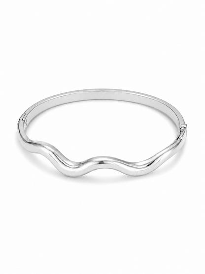 Fluid Wave hinged bangle in white gold over stainless steel, front three-quarter view