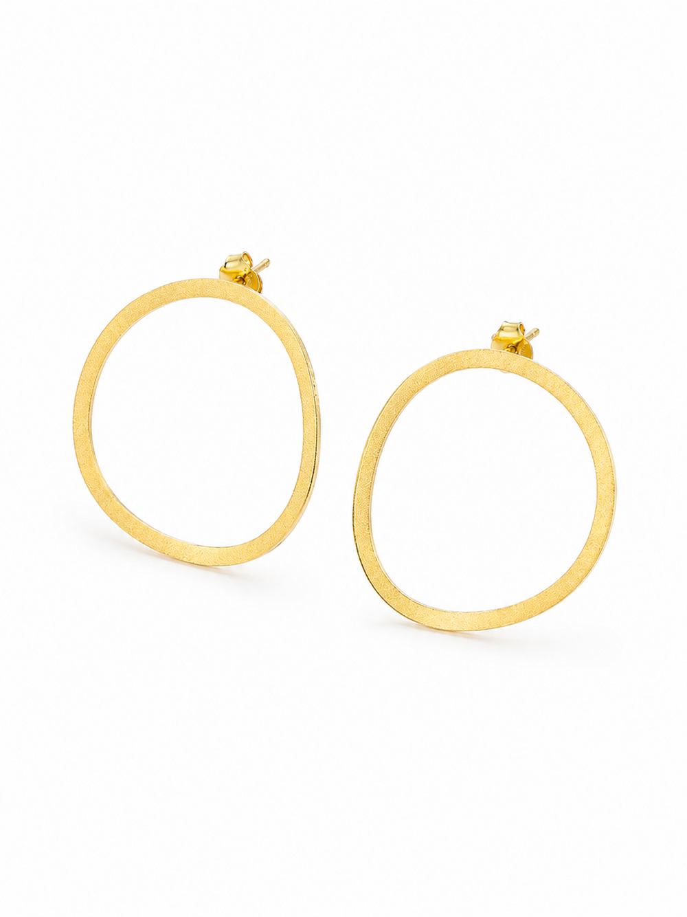 Ecommerce product view of the Seen, Not Felt statement stud earrings in 18K yellow gold vermeil, showing their lightweight softly irregular open outlines, fine brushed finish, slender flat construction, posts, and butterfly backs on a pure white background.
