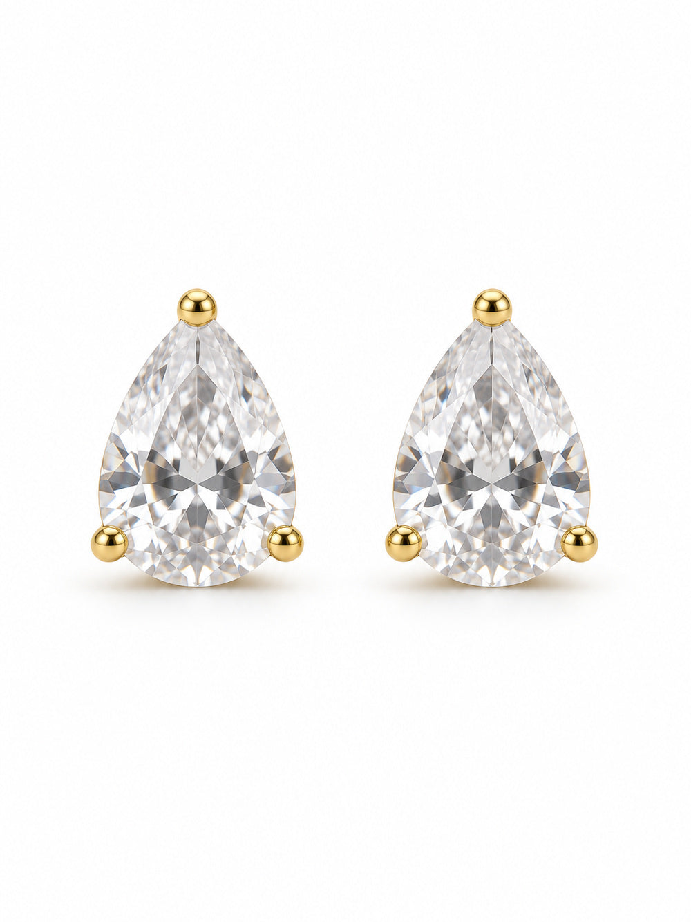 Pair of clear pear three-prong stud earrings in polished yellow-gold color on a white background