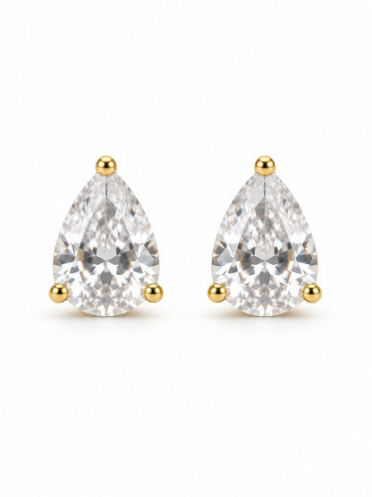Pair of clear pear three-prong stud earrings in polished yellow-gold color on a white background
