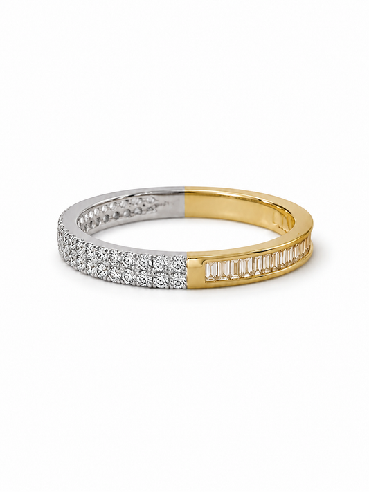 Duo-tone ring with a yellow-gold baguette-set half and a white-gold two-row pavé half