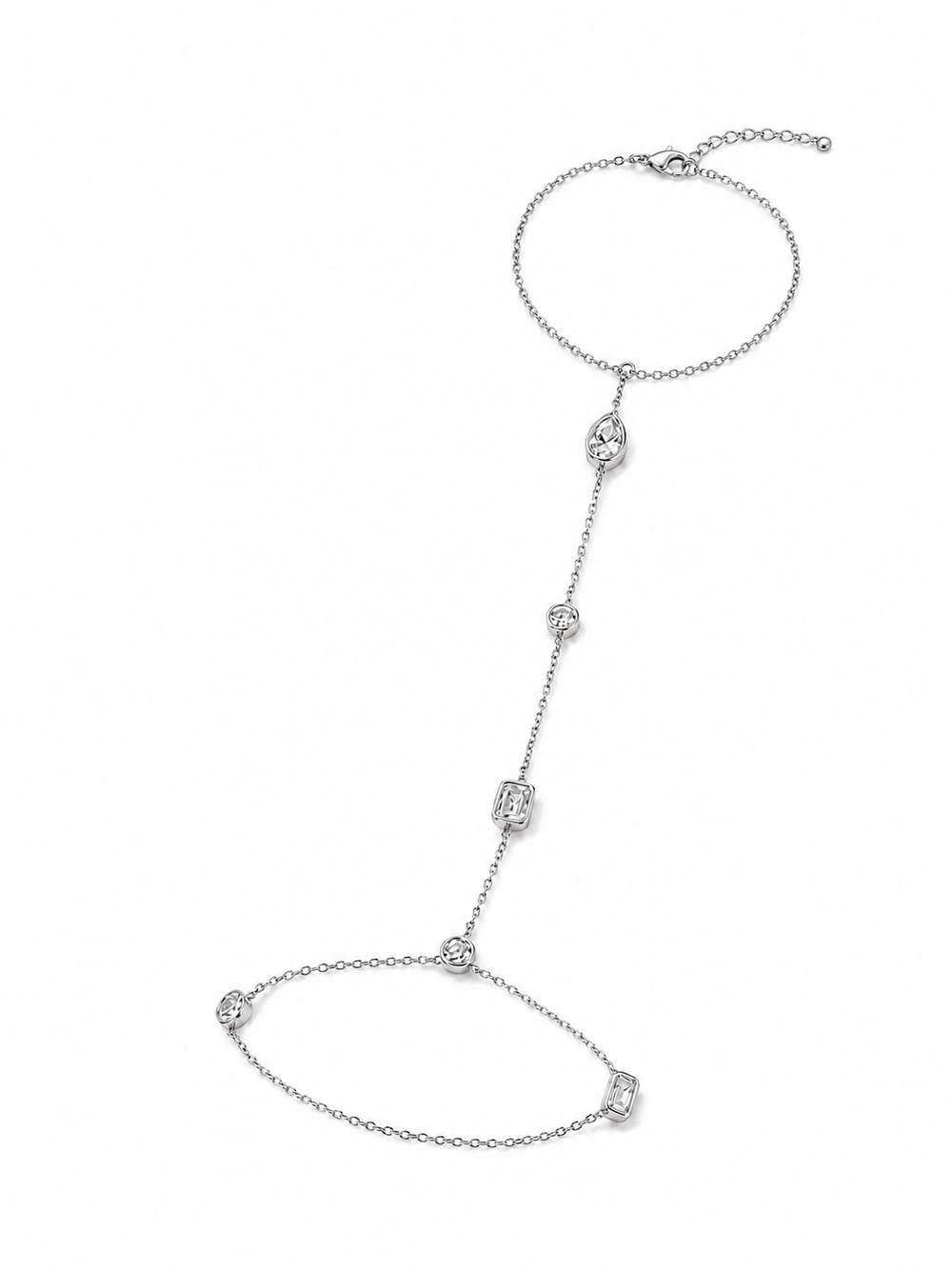 Mixed bezel hand chain in white gold with an adjustable bracelet wrist section, lobster clasp, extender, and clear bezel-set stones on white.