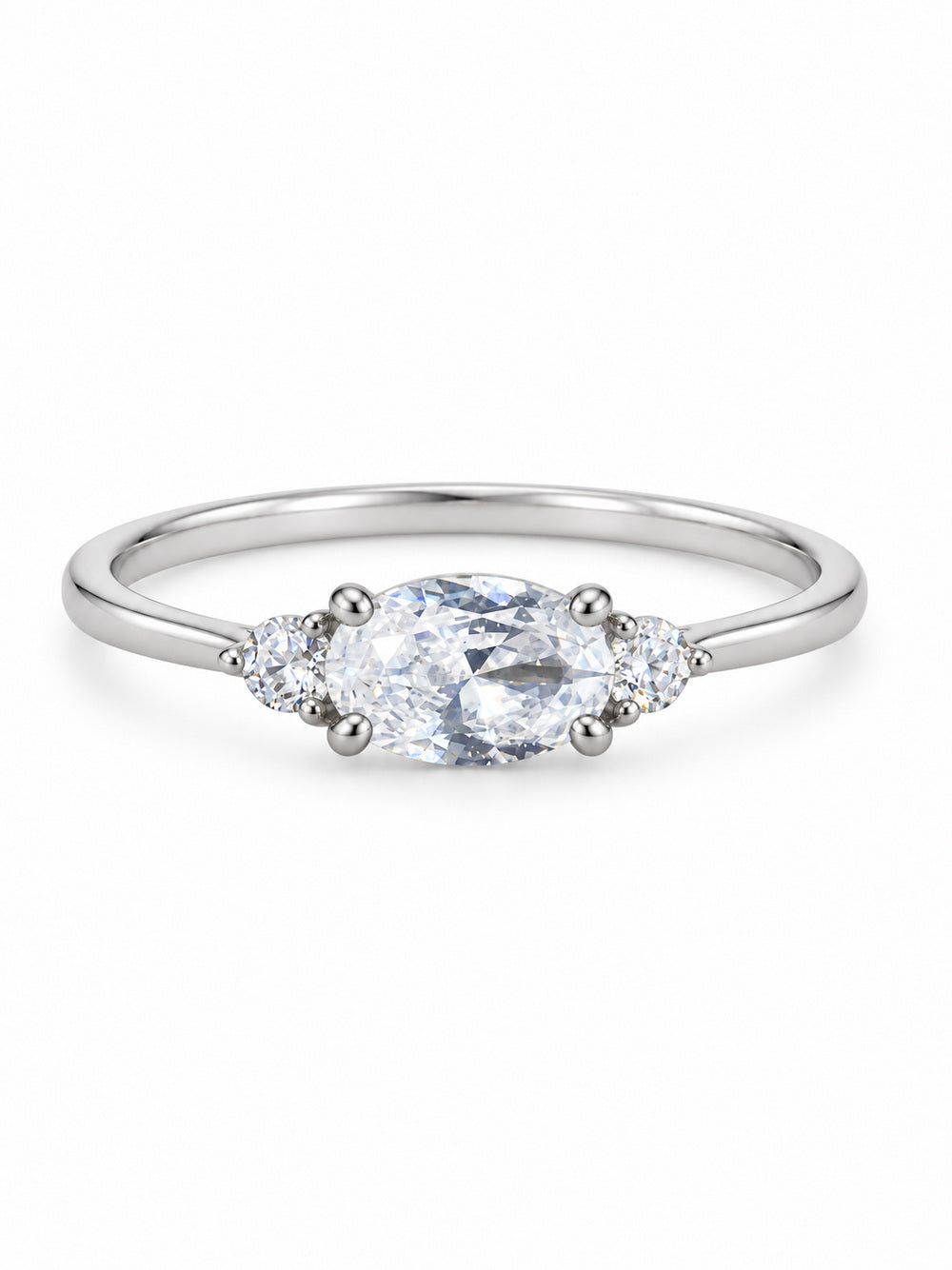 Three Wishes Oval Ring in white gold tone with a clear oval center stone and two round clear side stones