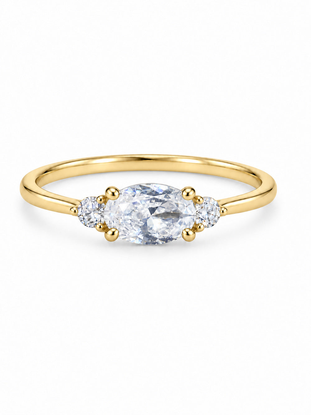 Three Wishes Oval Ring in yellow gold tone with a clear oval center stone and two round clear side stones