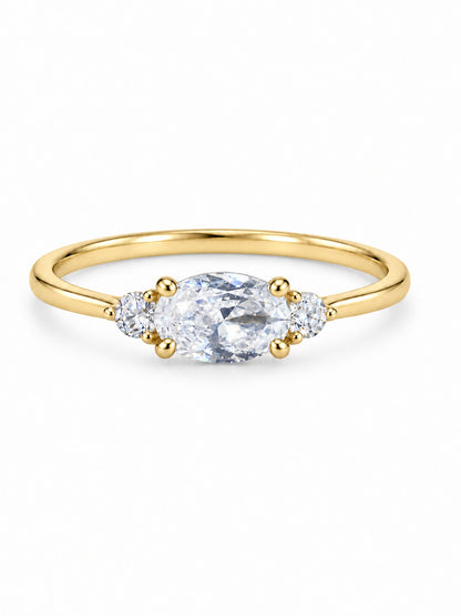 Three Wishes Oval Ring in yellow gold tone with a clear oval center stone and two round clear side stones