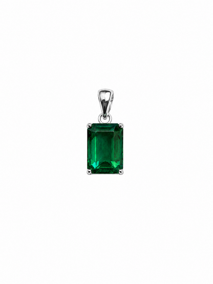 Verda emerald-green pendant with white-gold bail and four-prong setting, shown on white.